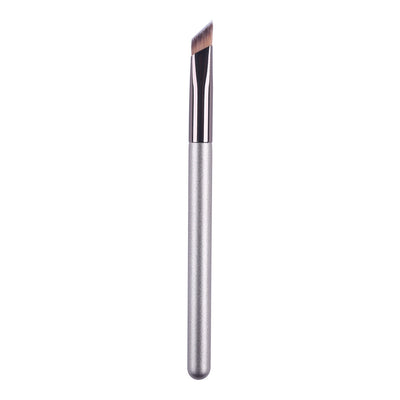 Makeup brush with a metallic handle on a white background