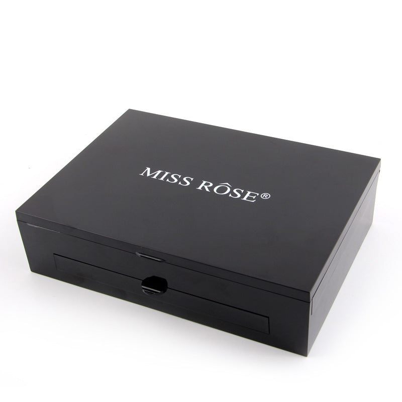Black cosmetic box with 'MISS ROSE' branding on a white background