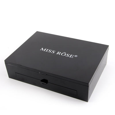 Black cosmetic box with 'MISS ROSE' branding on a white background