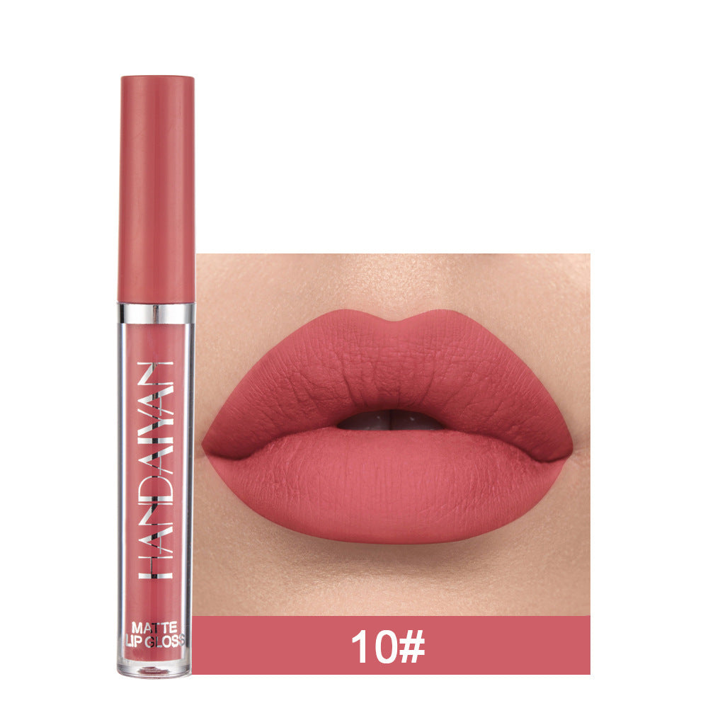 Lip gloss with a close-up of lips wearing the color, brand 'LAN DAWAN' visible.