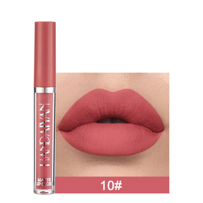 Lip gloss with a close-up of lips wearing the color, brand 'LAN DAWAN' visible.