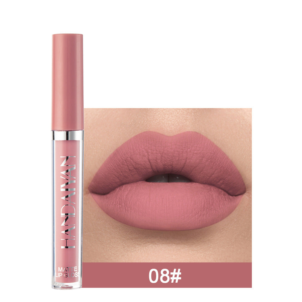 Lipstick with a close-up of lips wearing the shade on a white background