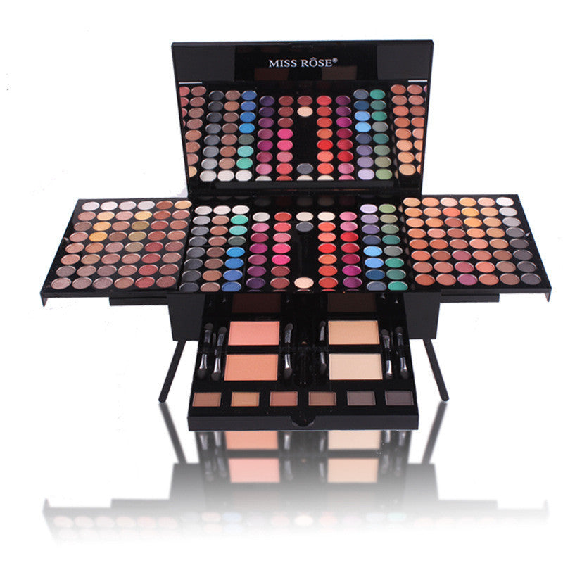 Makeup palette with various colors and tools on a white background, featuring the brand 'Miss Rose'.