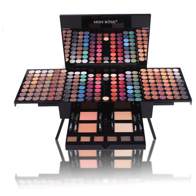 Makeup palette with various colors and tools on a white background, featuring the brand 'Miss Rose'.