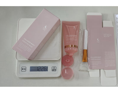 Cosmetic set with pink packaging on a digital scale