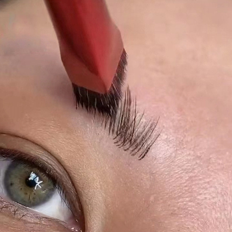 Eyebrow grooming with a red tool