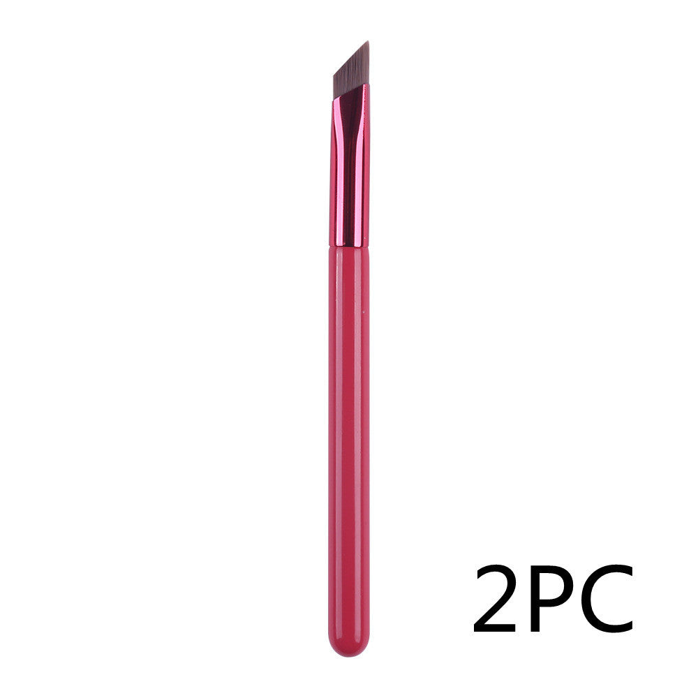 Red makeup brush with a white background and '2PC' text.